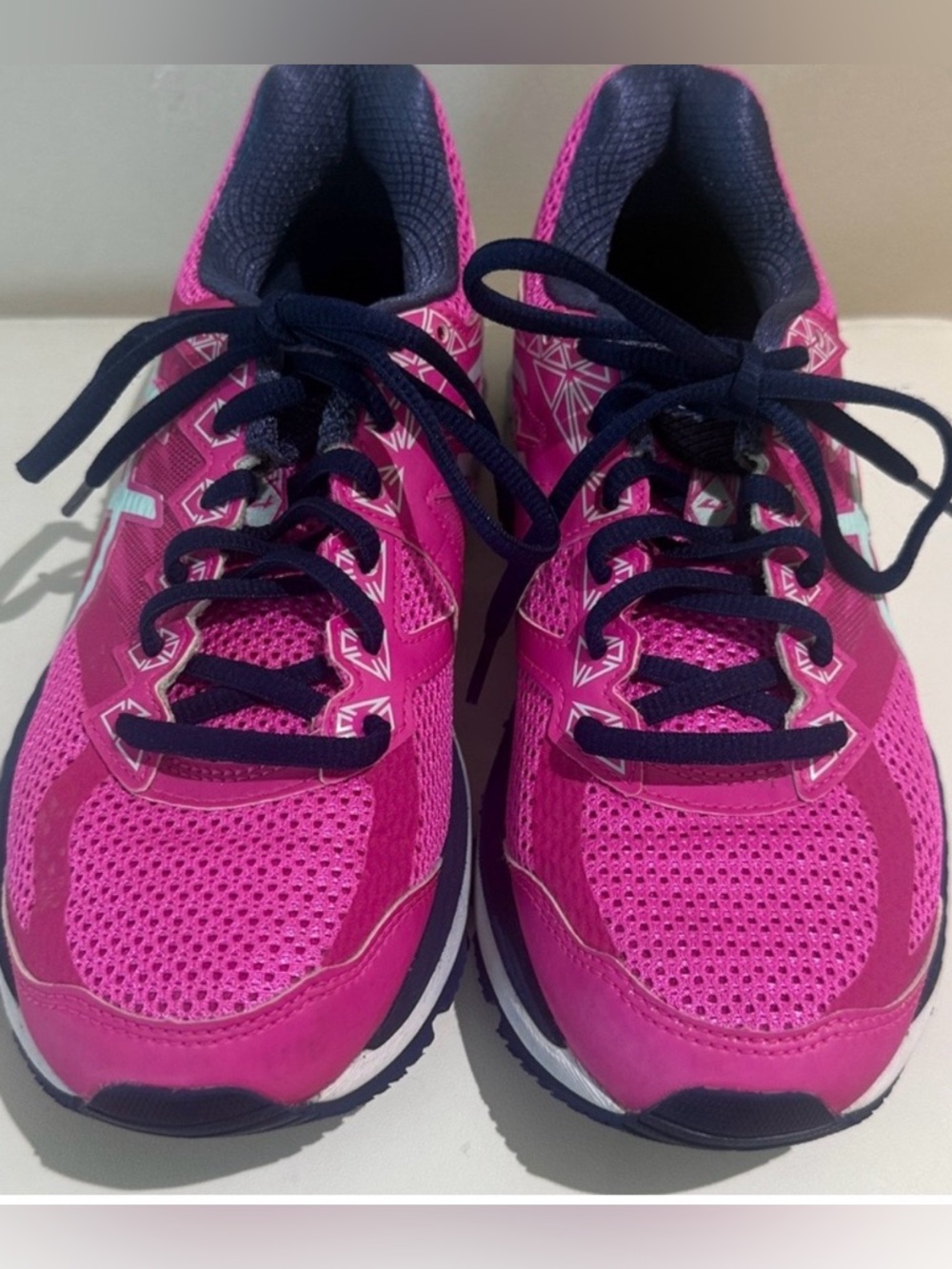 Asics Dynatic Duomax pink and navy athletic shoes